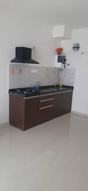 Kitchen in Studio Apartment at Gera World of Joy, Kharadi – for Rent