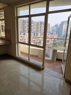 Kitchen in 2 BHK Apartment at Raheja Vedaanta, Sector 108 – for Rent
