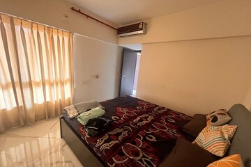 Bedroom in 2 BHK Apartment at Blumen Apartments, Vikhroli West – for Rent
