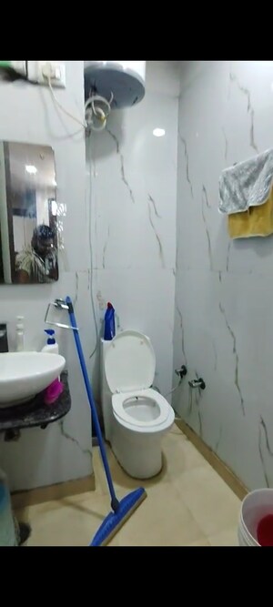 Bathroom in 3 BHK Builder Floor at Kanha Apartments Indirapuram, Shakti Khand 2 – for Sale