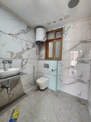 Bathroom in 2 BHK Builder Floor at Chattarpur – for Sale