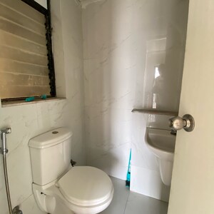 Bathroom in 1.5 BHK Apartment at Runwal Gardens Phase 2, Kalyan Shilphata Road – for Rent