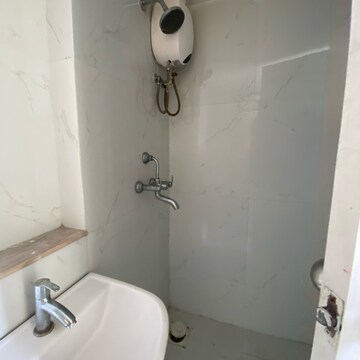 Bathroom in 1.5 BHK Apartment at Runwal Gardens Phase 2, Kalyan Shilphata Road – for Rent