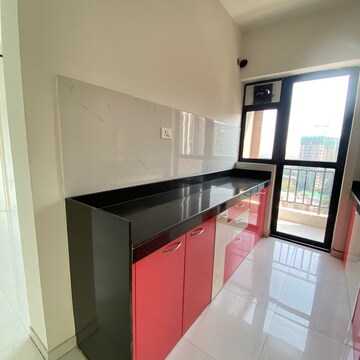 Kitchen in 1.5 BHK Apartment at Runwal Gardens Phase 2, Kalyan Shilphata Road – for Rent