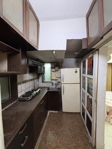 Kitchen in 2 BHK Apartment at Golds Green Apartment, Andheri West – for Rent