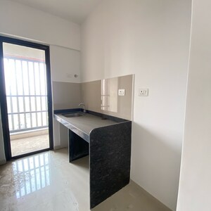 Kitchen in 1 BHK Apartment at Lodha Palava Downtown, Taloja Bypass Road – for Rent