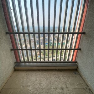 Balcony in 1 BHK Apartment at Lodha Palava Downtown, Taloja Bypass Road – for Rent