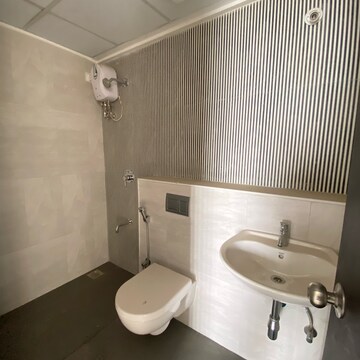 Bathroom in 1 BHK Apartment at Lodha Palava Downtown, Taloja Bypass Road – for Rent
