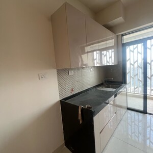 Kitchen in 4 BHK Apartment at Lodha Woods, Lokhandwala – for Rent