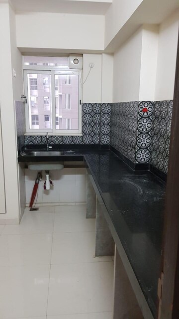 Kitchen in 1.5 BHK Apartment at Lodha Amara, Kolshet Road – for Sale