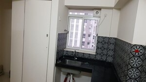 Kitchen in 1.5 BHK Apartment at Lodha Amara, Kolshet Road – for Sale