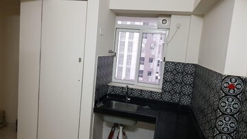 Kitchen in 1.5 BHK Apartment at Lodha Amara, Kolshet Road – for Sale