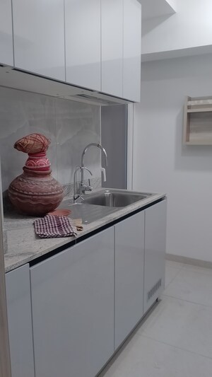 Kitchen in 3.5 BHK Builder Floor at DLF Gardencity Enclave, Sector 93 – for Rent