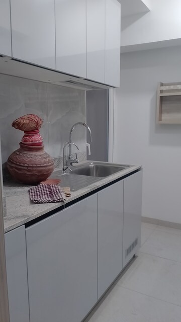 Kitchen in 3.5 BHK Builder Floor at DLF Gardencity Enclave, Sector 93 – for Rent