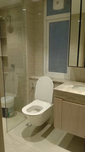 Bathroom in 3.5 BHK Builder Floor at DLF Gardencity Enclave, Sector 93 – for Rent