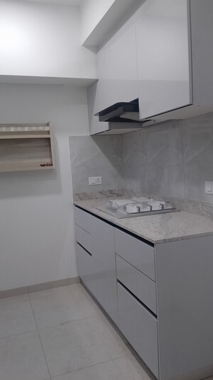 Kitchen in 3.5 BHK Builder Floor at DLF Gardencity Enclave, Sector 93 – for Rent