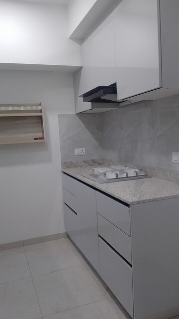 Kitchen in 3.5 BHK Builder Floor at DLF Gardencity Enclave, Sector 93 – for Rent