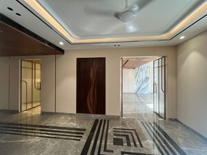 Bedroom in 4 BHK Builder Floor at Ansal Sushant Lok I, Sector 43 – for Rent