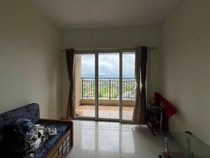 Living Room in 1 BHK Apartment at Kolte Patil Life Republic, Hinjewadi – for Rent