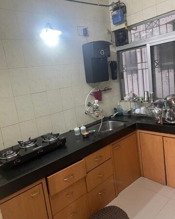 Kitchen in 2 BHK Apartment at Godrej Greens, Undri – for Rent