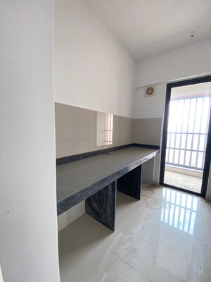 Kitchen in 1 BHK Apartment at Lodha Palava Downtown, Dombivli East – for Sale