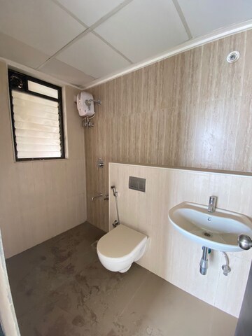 Bathroom in 1 BHK Apartment at Lodha Palava Downtown, Dombivli East – for Sale