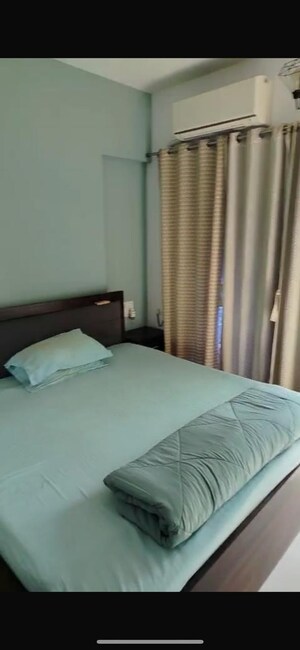Bedroom in 2 BHK Apartment at Cosmopolis Tower, Andheri West – for Rent