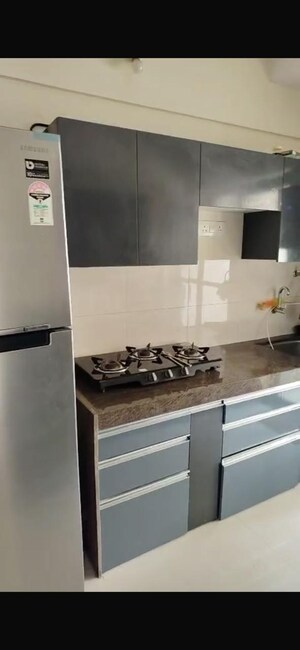 Kitchen in 2 BHK Apartment at Cosmopolis Tower, Andheri West – for Rent