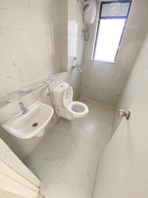Bathroom in 1 BHK Apartment at Runwal Gardens, Dombivli East – for Rent