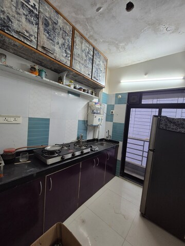 Kitchen in 2 BHK Apartment at Lily White Apartments, Ulwe Sector 3 – for Sale