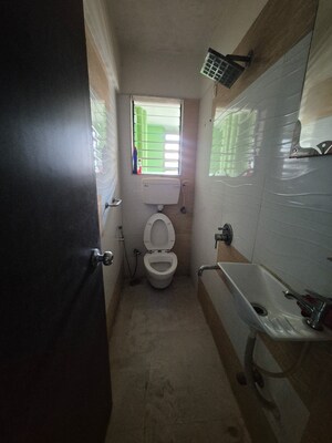 Bathroom in 2 BHK Apartment at Lily White Apartments, Ulwe Sector 3 – for Sale