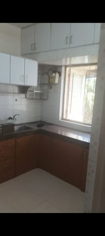Kitchen in 2 BHK Apartment at Takshila CHS, Andheri East – for Rent