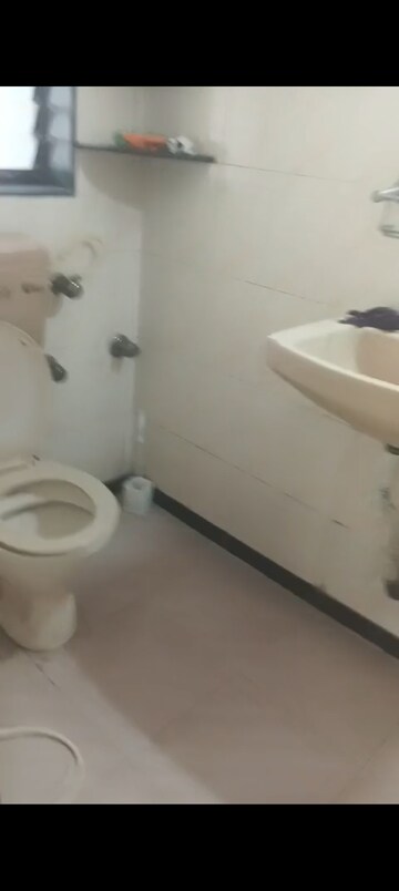 Bathroom in 2 BHK Apartment at Takshila CHS, Andheri East – for Rent