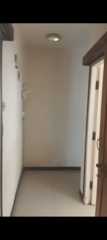 Building Lobby in 2 BHK Apartment at Takshila CHS, Andheri East – for Rent