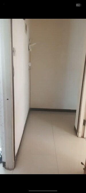 Building Lobby in 2 BHK Apartment at Takshila CHS, Andheri East – for Rent