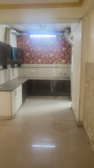 Kitchen in 3 BHK Apartment at Amrapali Zodiac, Sector 120 – for Rent