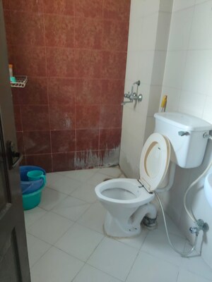 Bathroom in 2.5 BHK Apartment at Nilaya Greens, Raj Nagar Extension – for Rent
