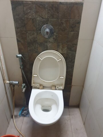 Bathroom in 2 BHK Apartment at Omkar Raga, Chembur – for Rent