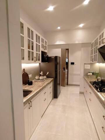 Kitchen in 3 BHK Apartment at Prestige Garden Trails, Mira Road – for Sale