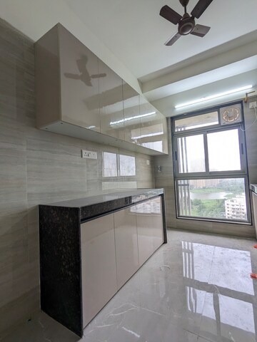 Kitchen in 2 BHK Apartment at Veena Smart Homes, Kandivali West – for Rent