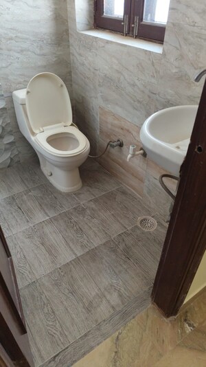 Bathroom in 3 BHK Apartment at Orchid Island, Sector 51 – for Rent