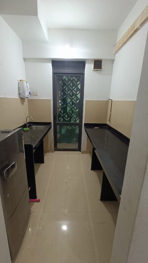 Kitchen in 1.5 BHK Apartment at Lodha Lakeshore Greens, Dombivli East – for Rent