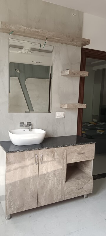 Bathroom in 3 BHK Apartment at Mansarovar – for Sale