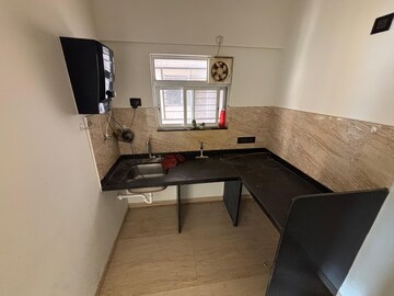 Kitchen in 2 BHK Apartment at Godrej Boulevard, Manjari – for Rent