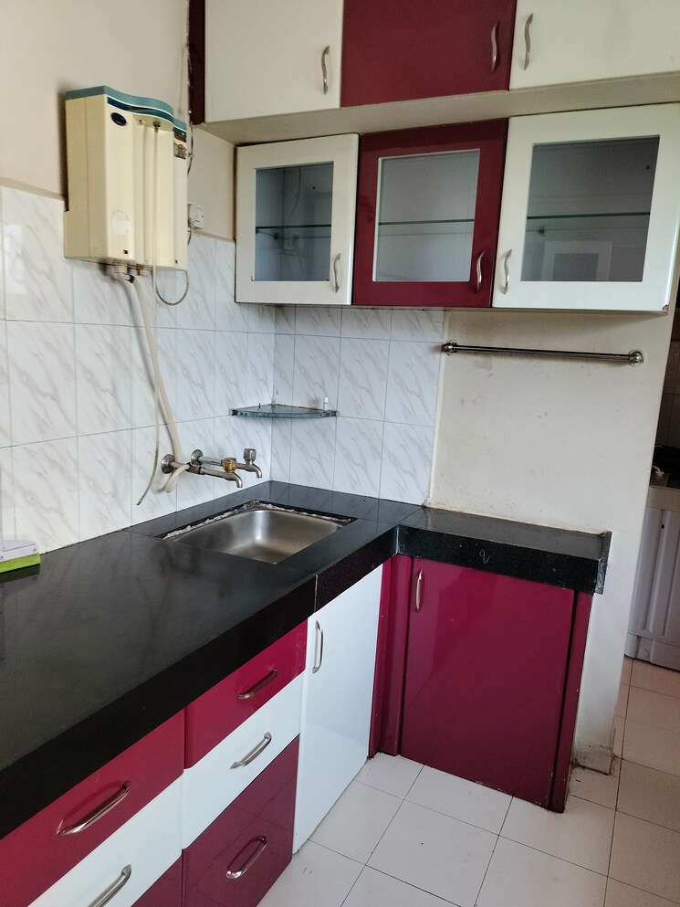 Kitchen, laxmi-nagar-society 2 Bedroom 870 Sq.Ft. Apartment In Dhanori Pune 9508439