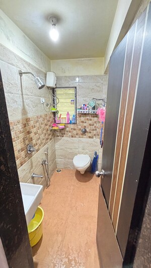 Bathroom in 2 BHK Apartment at JHV Hira Laxmi Heights, Ulwe Sector 9 – for Sale