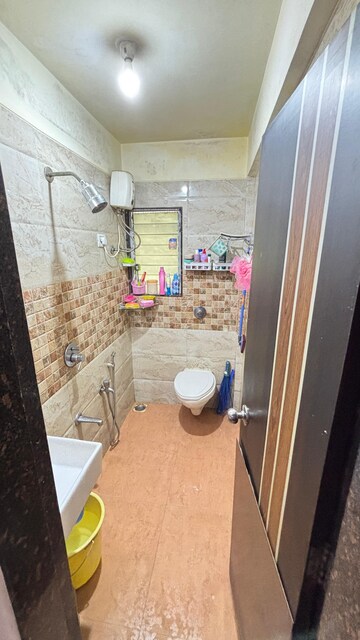 Bathroom in 2 BHK Apartment at JHV Hira Laxmi Heights, Ulwe Sector 9 – for Sale