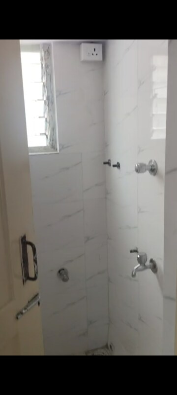 Bathroom in 1 BHK Apartment at Satpuda Nagari Nivara CHS, Goregaon East – for Sale