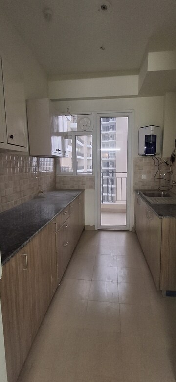 Kitchen in 3 BHK Apartment at Amrapali Crystal Homes, Sector 76 – for Rent