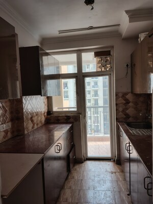 Kitchen in 3 BHK Apartment at Amrapali Riverview, Amrapali Leisure Valley – for Rent